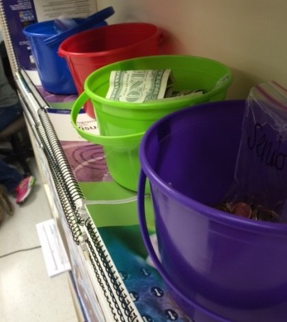 FBLA uses different colored buckets to collect the money for the fundraiser.