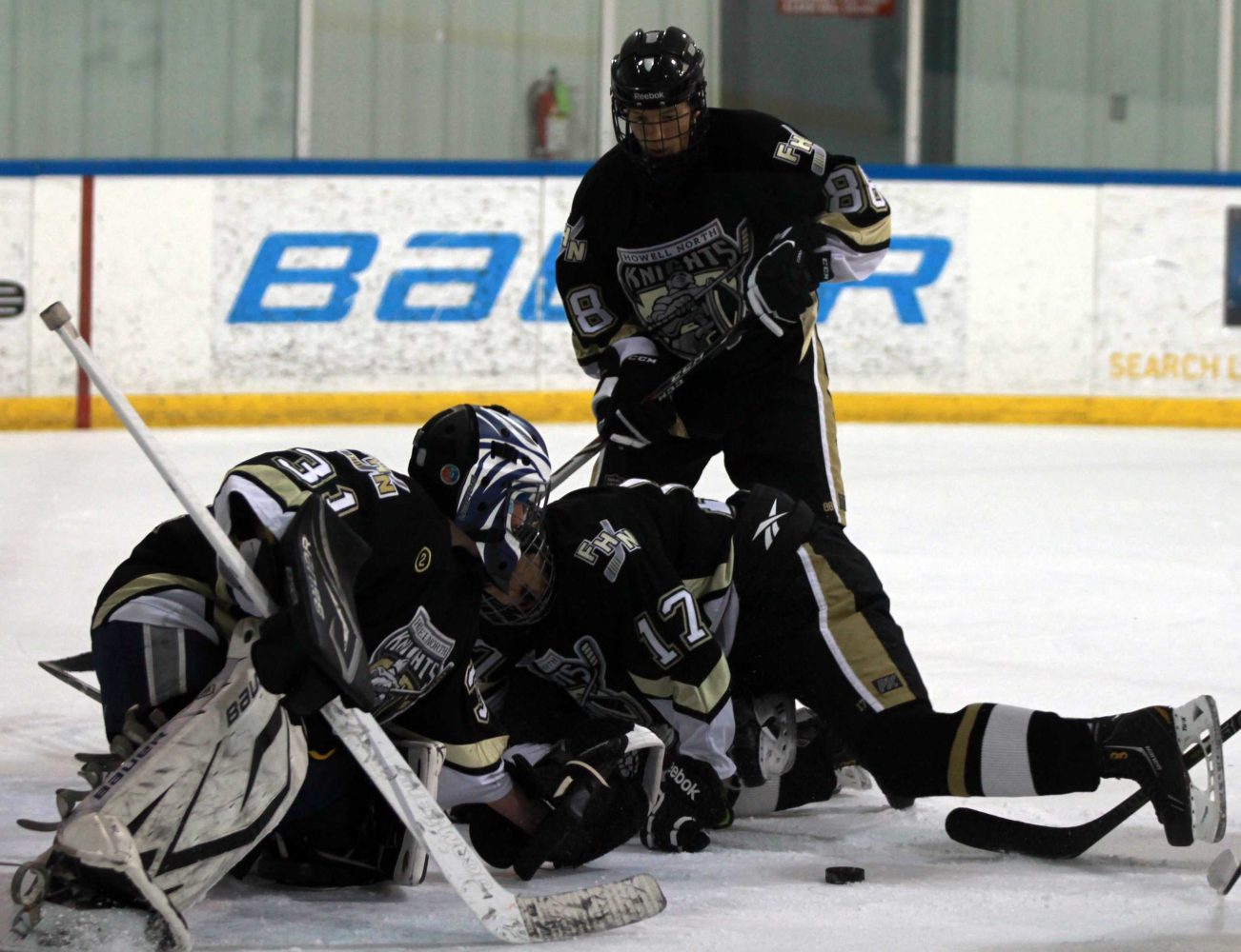 North Knights Varsity Hockey Eliminated by Rival Howell Central.
