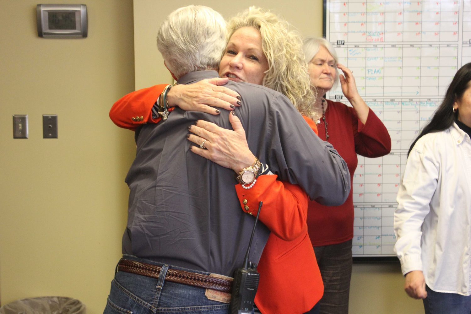 Head Principal Jack Ameis receives a hug from FHSD Superintendent Pam Sloan after he was presented with his award (matt krieg).