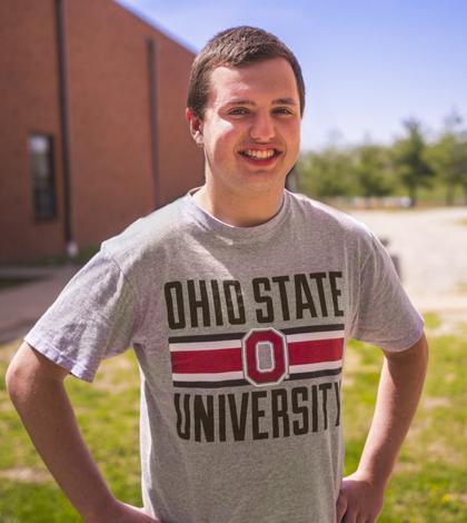 Matt Schneider poses in his Ohio State shirt. (Photo by Cameron McCarty)