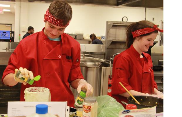 Members of the Iron Chef team compete in the annual Iron Chef Competition.