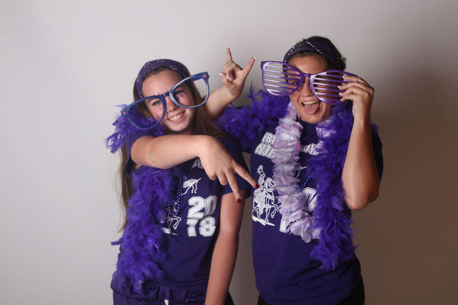 Sophomores, Baylee Franzen and Emma Durhan show off their spirit wear for class colors day during spirit week. All classes dress up in their colors for the pep assembly, and compete to see who is the loudest class during the spirit meter. “I think our classs compared really well with other classes. We went all out for the pep assembly,” Durhan said. 
