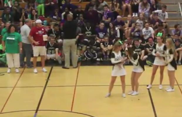 FHN Cheerleaders kiss a pig at the 2015 FHN Pep Assembly [Video]