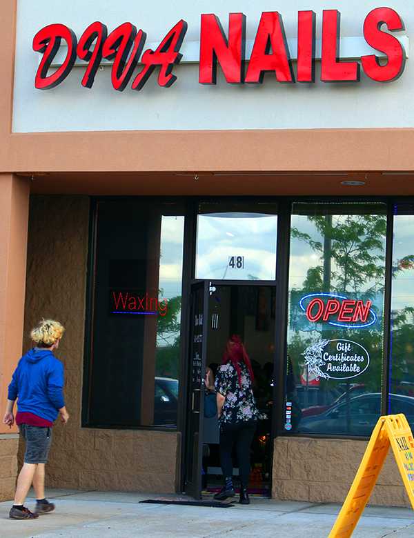 Junior December Brown walks into Diva Nails on April 27.  Diva Nails is a nail salon on Jungermann Road in St.Charles, Missouri. Diva Nails has an ad with our newspaper, North Star, for two dollars off if you show them your photo ID. 