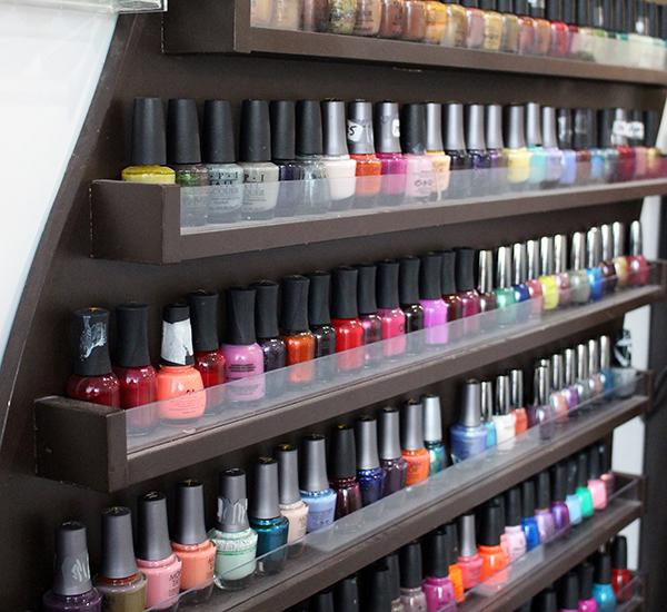 The variety of colors sit on the shelf at Diva Nails. Every nail salon you walk into one of the first thing you will see is the huge selection of nail polishes. 