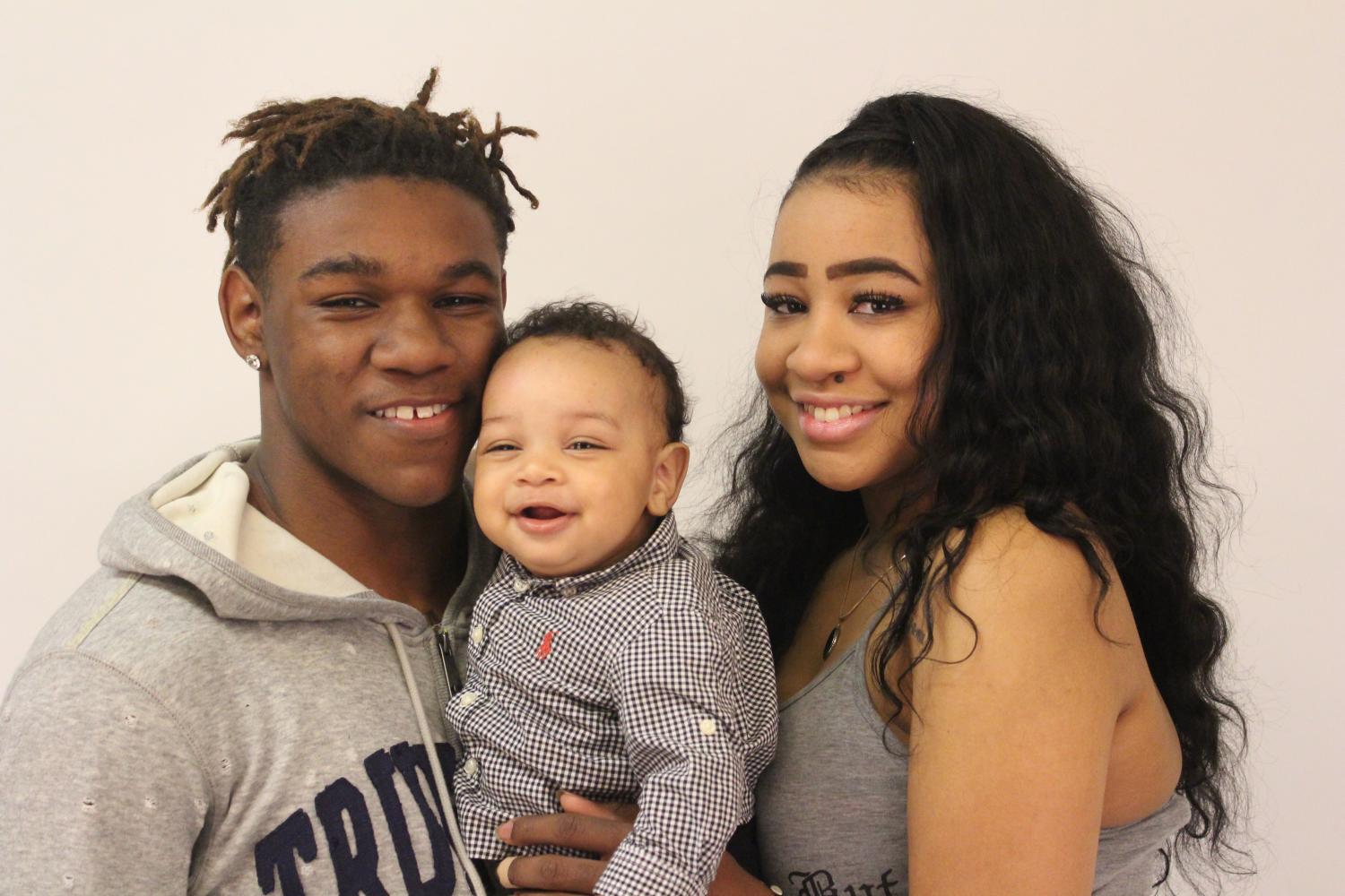 From left to right: Donnell, Donnell Jr. and India smile for the camera