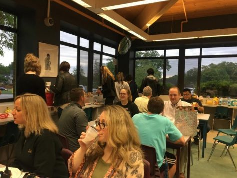 FHN seniors and faculty gather in the learning commons for a past secret scholar breakfast in April. 