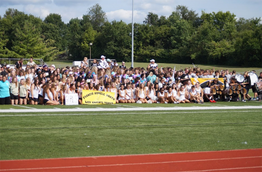 Fall sports teams gather on the Stadium field after the Parade of Athletes.(photo submitted)