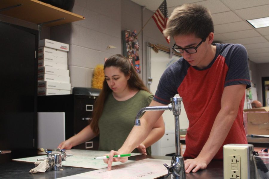 Cooper Redington and Sophia Couteranis work on designing an emergency room floor plan in their Biomedical Innovations class. To take this class they both must travel from their school, FHC, to FHN due to the class not being offered there. This is the first year BI has been offered at FHN.