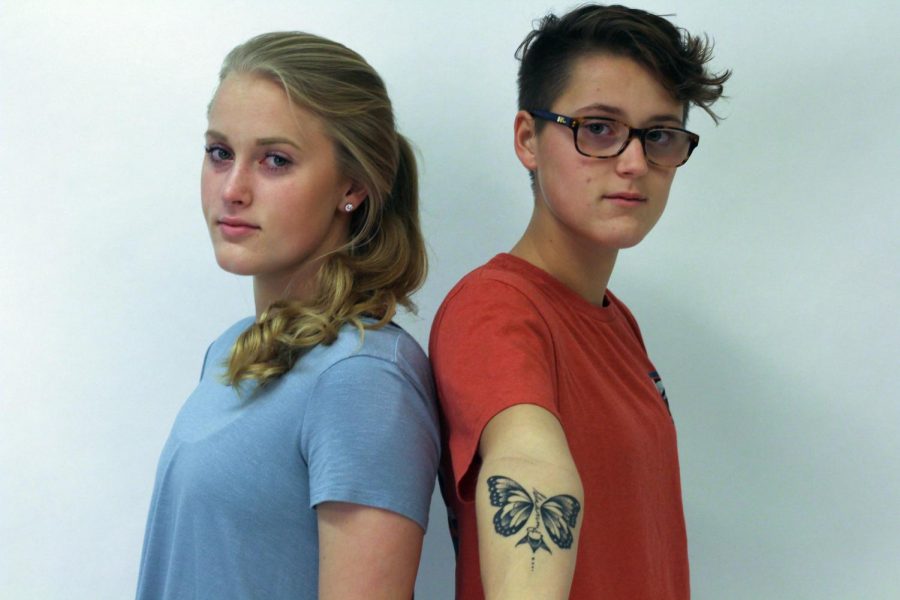 Phoebe and Amelia Primeau pose together to show off their matching tattoos. Pheobe’s tattoo is located on her right forearm and Amelia’s is on her upper back with a drawing of a butterfly with “Granny” written on it. The sisters are happy that they will have the tattoos on them forever as a reminder of their great-grandmother. 