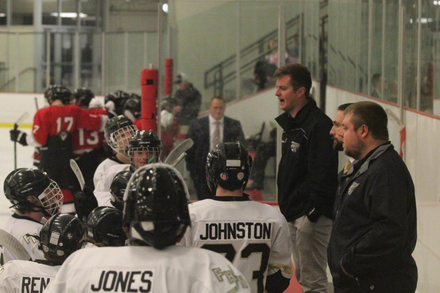 Varsity hockey coach Ryan Gannon talks to his team during a stoppage of play on 11/10 vs. Fort Zumwalt South. 