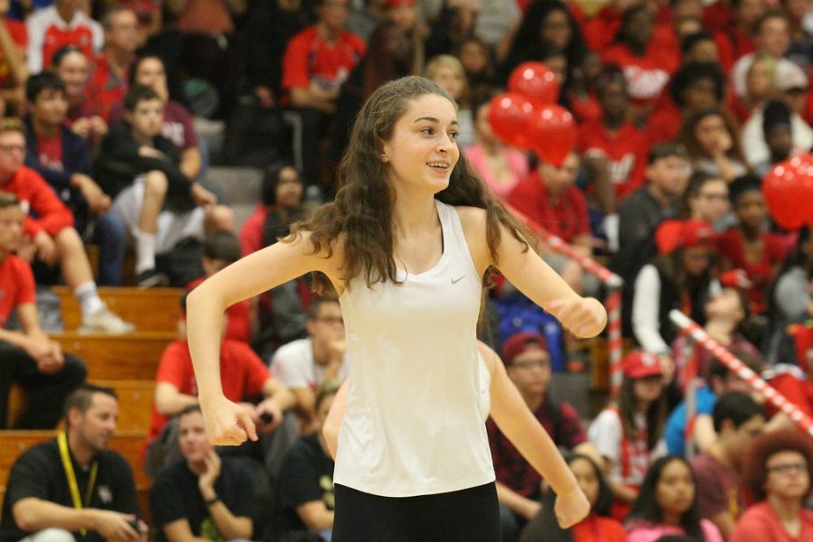 Sophomore Cami Gonzalez performs with Knightline at the Homecoming Pep Assembly on Sept. 21, 2017.  Gonzalez was diagnosed with Snapping Hip Syndrome and decided to sit out the rest  of the Knightline season.