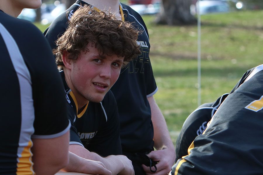 Senior Floris Kruger kneels during a stoppage of play in a varsity rugby match vs. Chaminade on 4/11. 