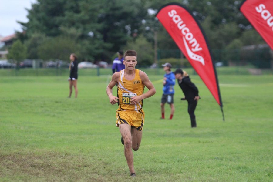Peyton Hebert runs for the FHN boys varsity cross country team. During his junior year, he decided to quit football and start running Cross Country. Hebert ran one of his last races on Sept. 8 at Forest Park for the team, finishing in the top 15.