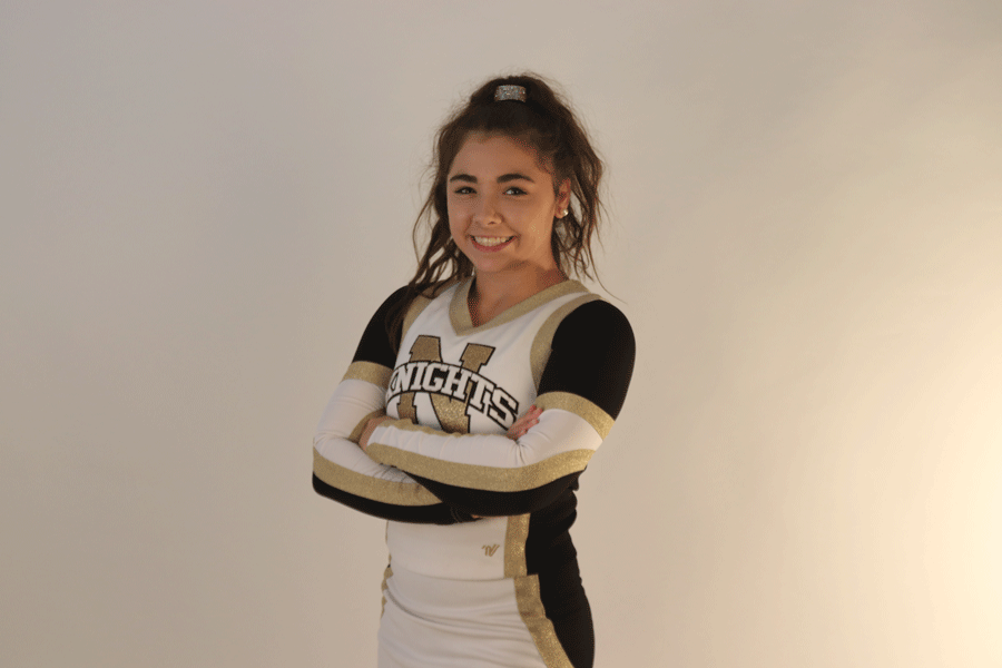 Senior Morghen Fisher Regularly Battles Back Pain While Cheering