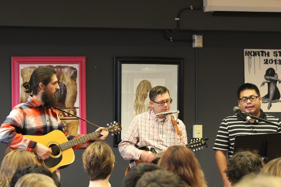 (From Left to Right) Math teacher Greg Brown, Assistant Principal Chris Birch and Spanish teacher Brian Santos, perform at the annual Coffee House on Feb. 14, 2018.