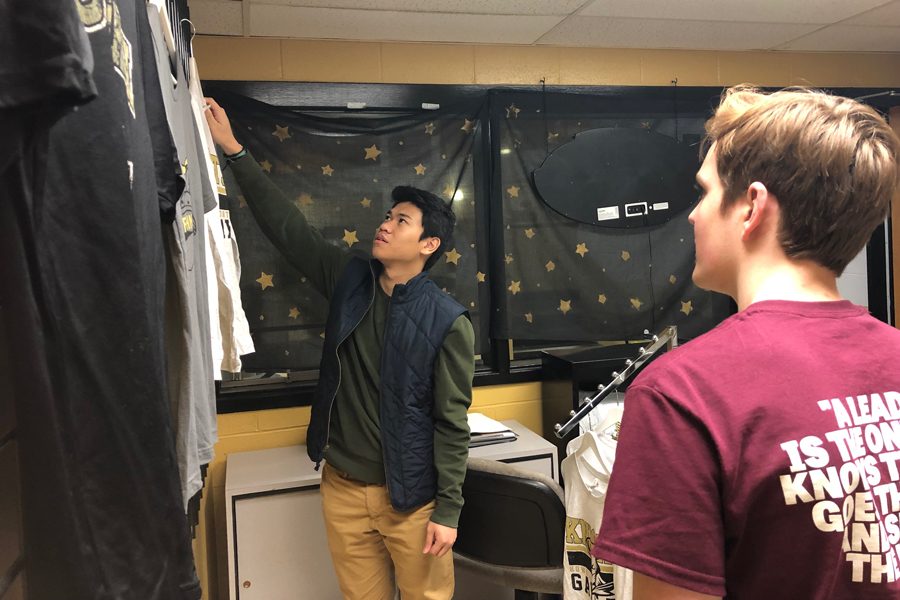 StuCo Vice President Juan Alega and StuCo Brendan Gannon discuss items in the new StuCo sponsored spirit store, The Armory. This store will open on Jan. 29, after almost a year of planning.