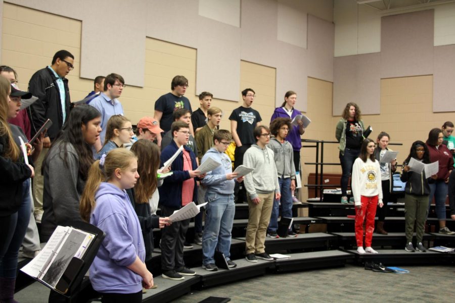 Choir students rehearse in the choir room for their trip to New York which is on Feb. 15. The students will be performing with Ola Gjeilo, a Norwegian composer who is known for his choral music. Prior to the performance, many students were looking
forward to the opportunity of working with him.