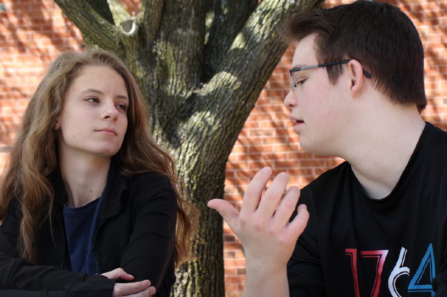 Friends, sophomore Allie Moore and junior Bret Hammond, sit and chat in the courtyard. The
pair have been friends for over a year and have formed a very strong, unique bond. They
frequently go out to sporting events together and participate in many fundraising events for
Down Syndrome.