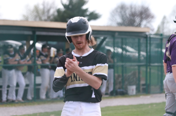 Junior Chase Holder claps after scoring run against Troy.