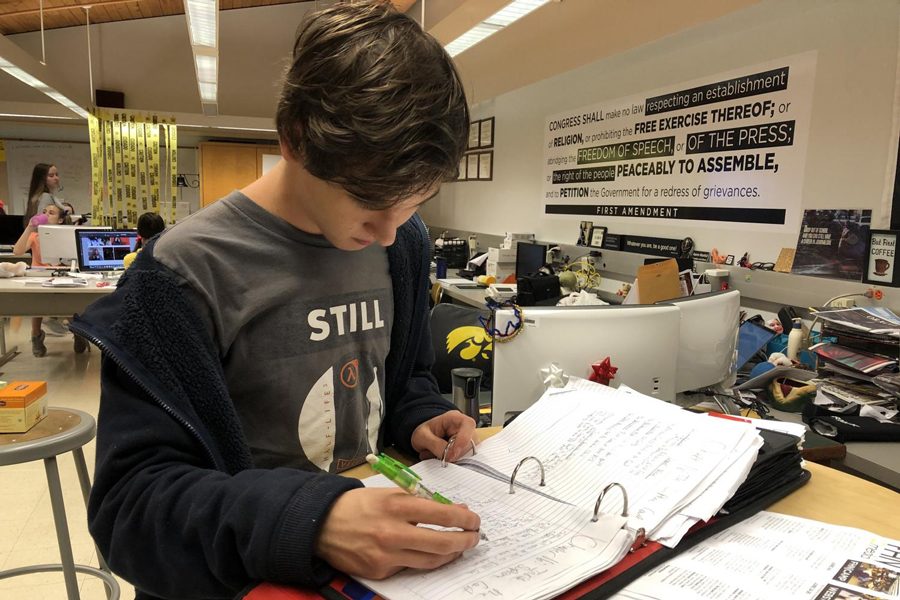 During class, junior Connor Peper studies for the ACT. It is an exam used to measure a students academic abilities. Peper has previously taken this exam three times.