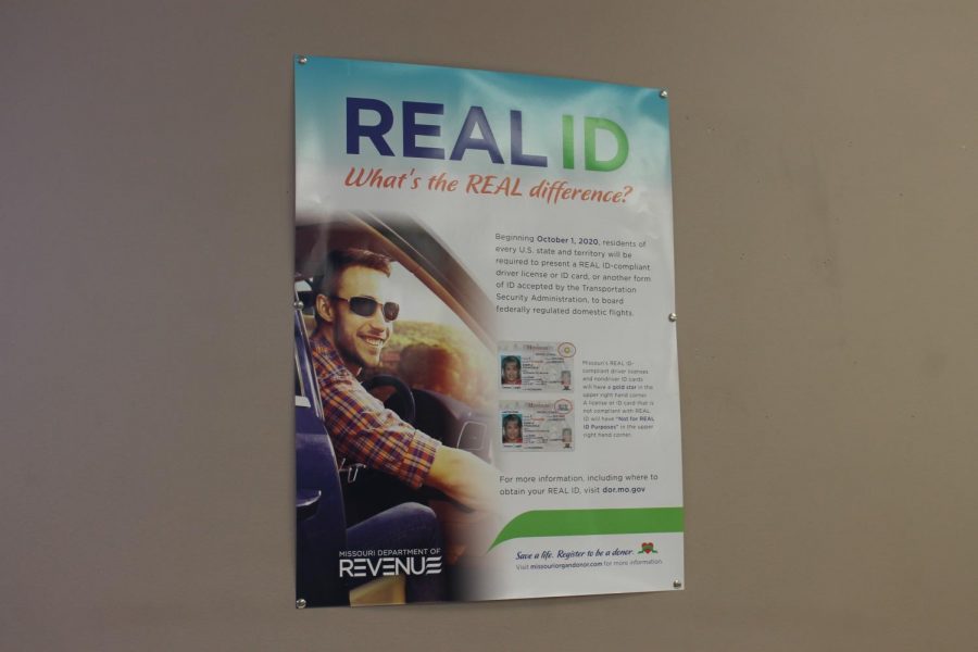 A poster hangs on the wall in the DMV to show that
Missouri is making new ID’s. Missouri’s old ID’s have been around since 2005 and older. The change finally happened in March when they decided to go with the REAL ID idea from the Federal Government.