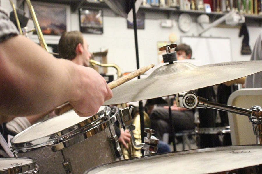Senior Cole Hayse plays the drums during class. Hayse has been a part of band for seven years and mainly plays the drums. “My favorite part of band has to be the teacher. Mr. [Robert] Stegeman is a really good guy and an even better teacher,” Hayse said.