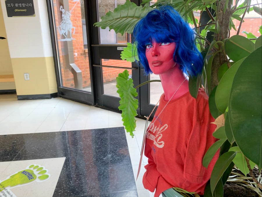 Monique sits in the front lobby. Students can take pictures with her and upload them to social media for the chance to win a prize.