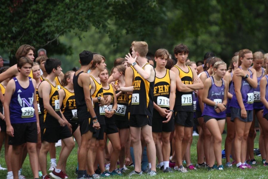The cross country team groups up before a big meet.