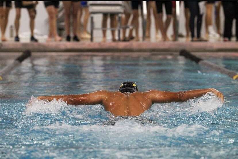 Sophomore Om Nair competes in a swim competition at the Rec Plex.