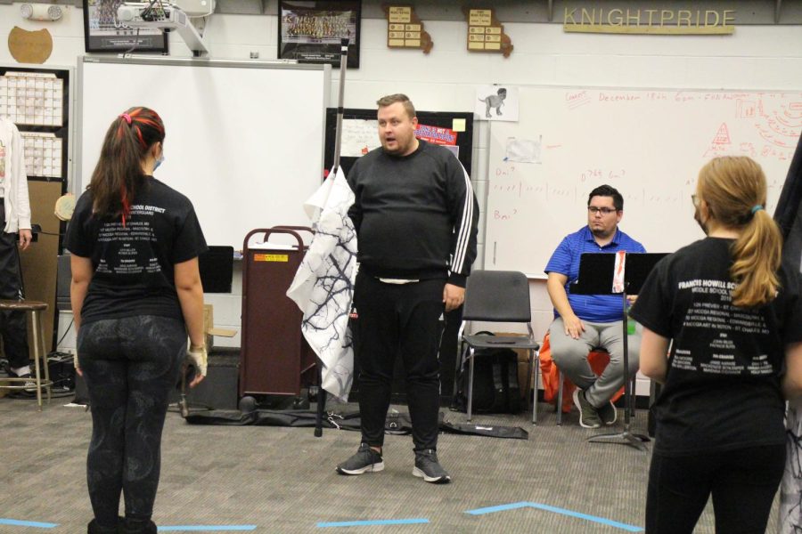 Winter Guard Coaches, Mr.Carrey and Mr Eaton instructing the team during practice on November 17. Students were preparing a routine for the current winter season. The members were also led by Mr Welker. 
