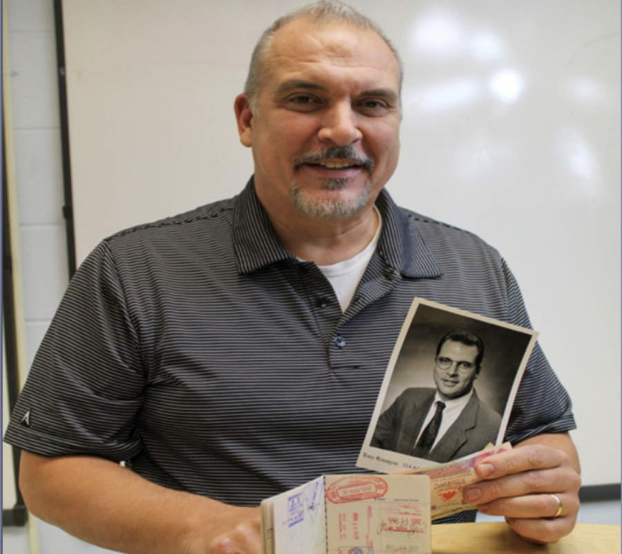 FHN science teacher, Anthony Roungon,
displays his passport, coins, dollars, and an
old photograph of himself from when he
traveled.