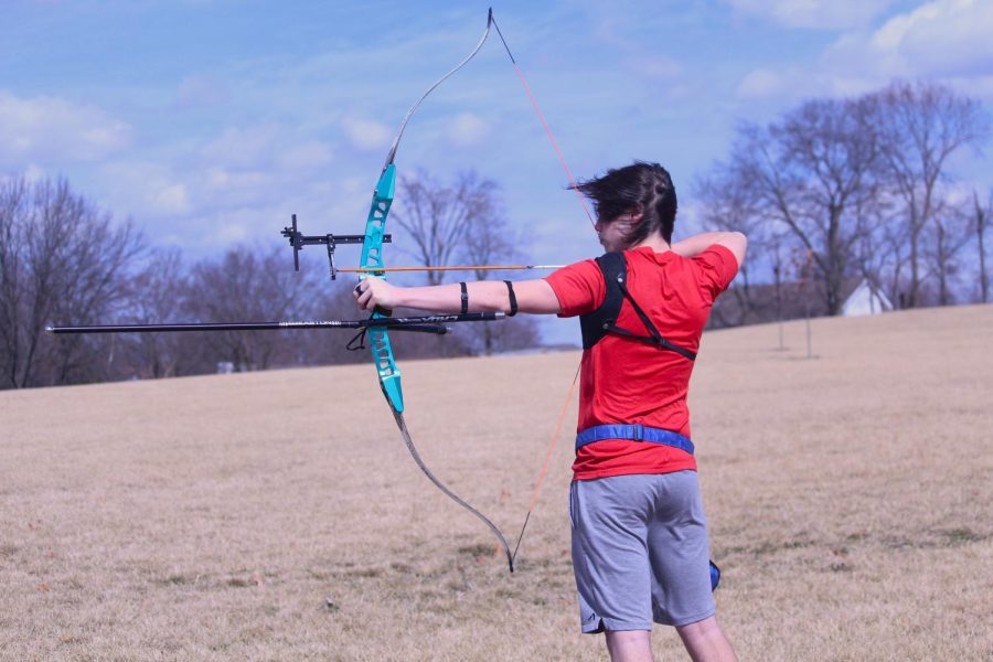 Conner Rowland draws his bow back at the range. Rowland has been
doing archery for four years. 