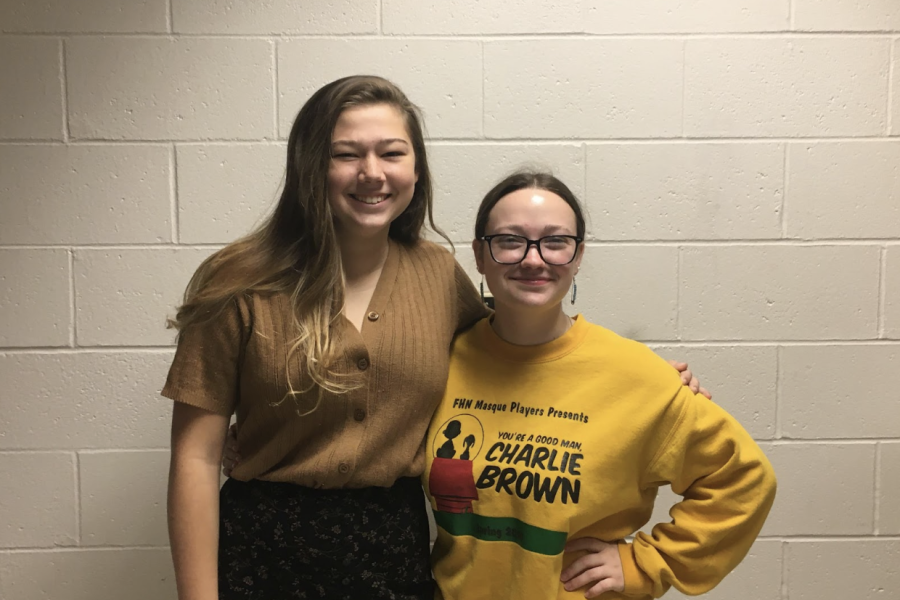 Officers vice president Clara Bonstead and president Piper Orzel of the drama club stand together