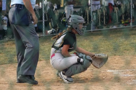 On Oct. 5, Junior Ryleigh Albers plays catcher for the FHN girls varsity softball teams senior night at FHN’s field. The girls would go on to win the game against North Point 12-2.