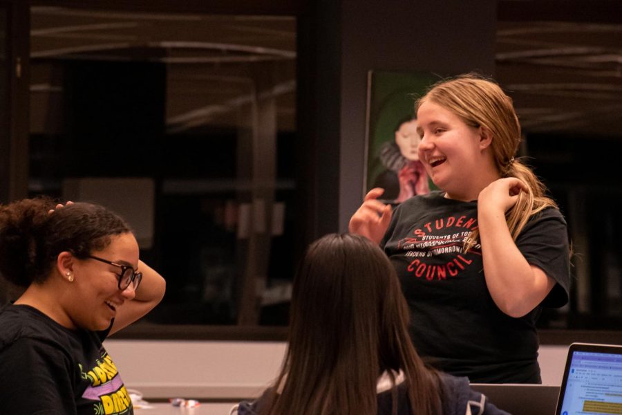After school at 7pm, Mock Trial members share laughs together before their meeting on Feb 14. As members are coming into the library, members are joking around with each other and sharing laughs before they begin their nightly practice