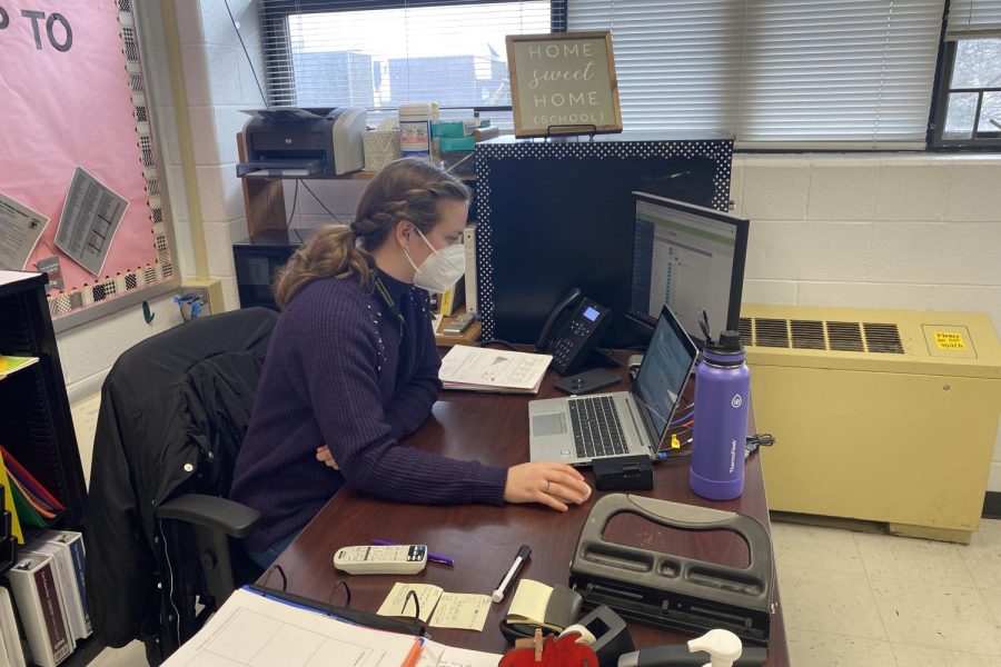 On March 2, Rowan Pugh works at her desk as students write an essay for AP Lang. 