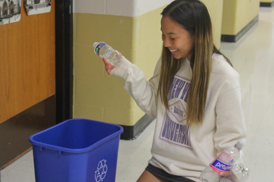 Senior Hailey Zhang recycles for one of the various extracurricular activities that she is involved in. 