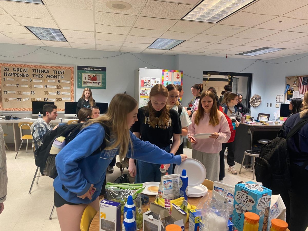 Students from around the school come together to have pancakes on Friday Feb.23 to celebrate the end of Scholastic Journalism Week