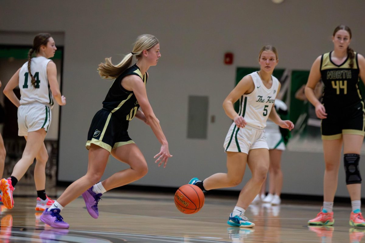 Girls Varsity Basketball Takes The Lead Over Orchard Farm [Photo Gallery]