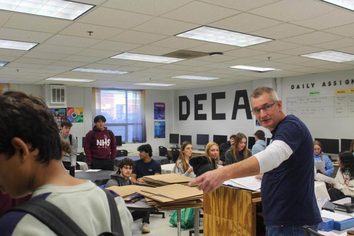 On Thursday, Feb. 29, FHN DECA hosts a meeting with all of the 35 DECA state qualifiers. DECA sponsor Micheal Freedline speaks on the details about their upcoming trip to Kansas City March third through fifth. 
