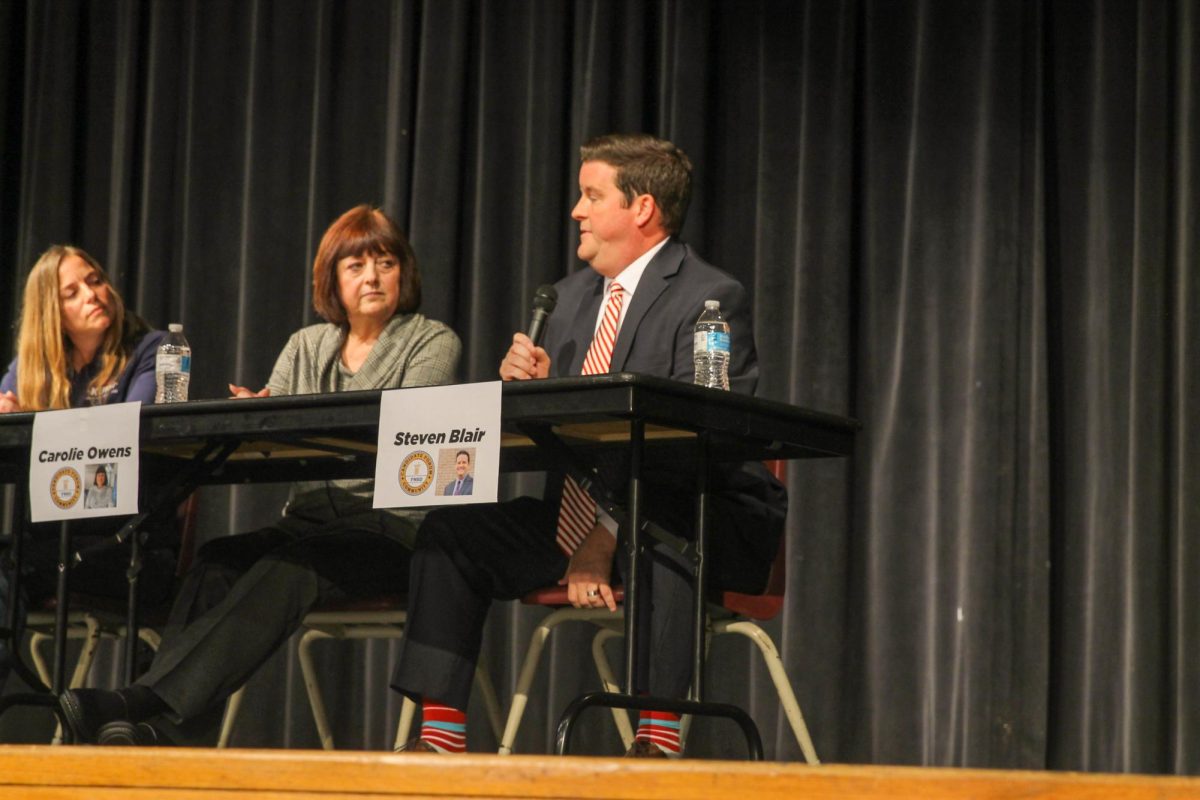 On March 19, school board candidate Steven Blair answers an audience question at the school board candidate forum to portray his viewpoints on a subject. Blair is one of the four members running for the two spots opening due to directors Janet Stiglitch and Chad Langes retirings.