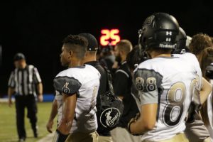 Stefan Cameron (left), Dillon Lauer (right) and the rest of the Knights sideline looks on in nervous tension (Chase Meyer)