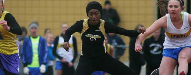 Brea Holmes jumps hudles at the JV Track Meet on March 24.