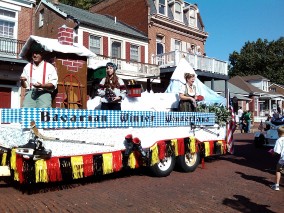 Richterkessing tossed candy to children at the St. Charles Oktoberfest parade.