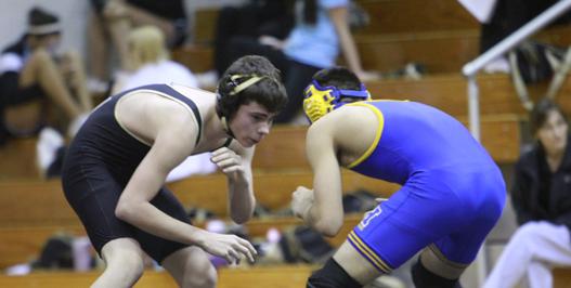 Varsity Wrestling Falls to Howell