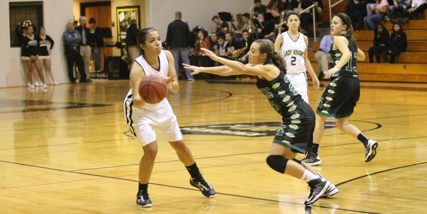 Senior Hali Long tries to keep control of the ball. Photo by Jimmy Higgins.