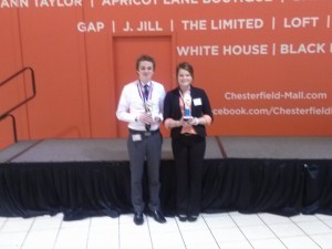 Troy Ostermann and Jordan Stobart stand with their awards after the FBLA competition. (submitted photo)