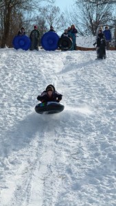 Kids sled at Laurel Park after St. Louis' last big snow storm hit in 2011 (file photo)