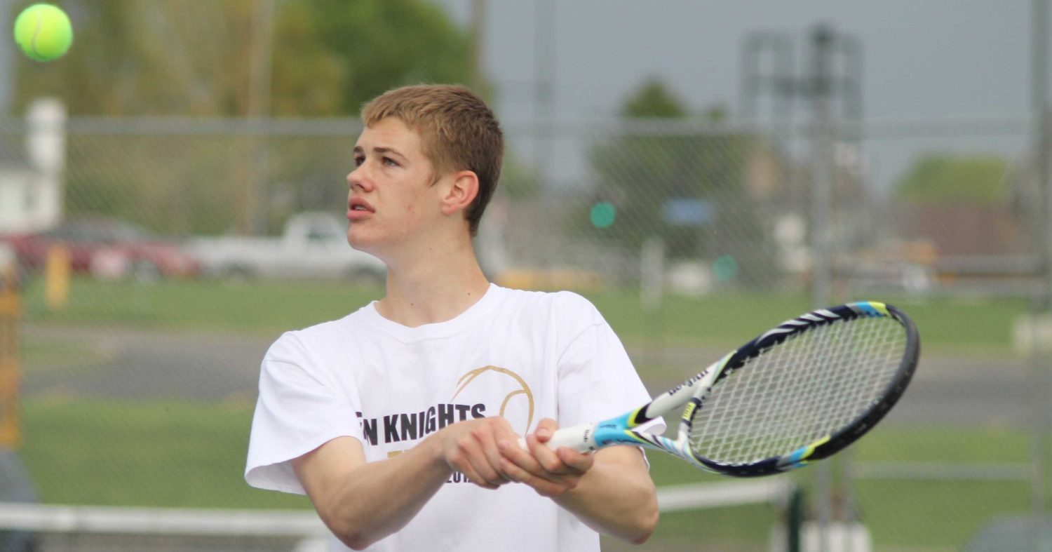 Senior Nick Cole prepares to return the ball back to his opponent. 